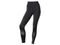 Zwarte leggings met mesh panelen voor sporten.