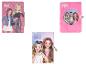 Drie Forever Girlie notitieboeken: twee met cartoonmeisjes en één roze pluizige met glitter.