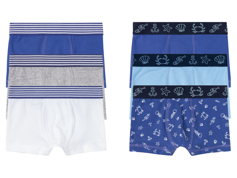 Een pakje met vier boxershorts voor jongens, met zeedierenprint.