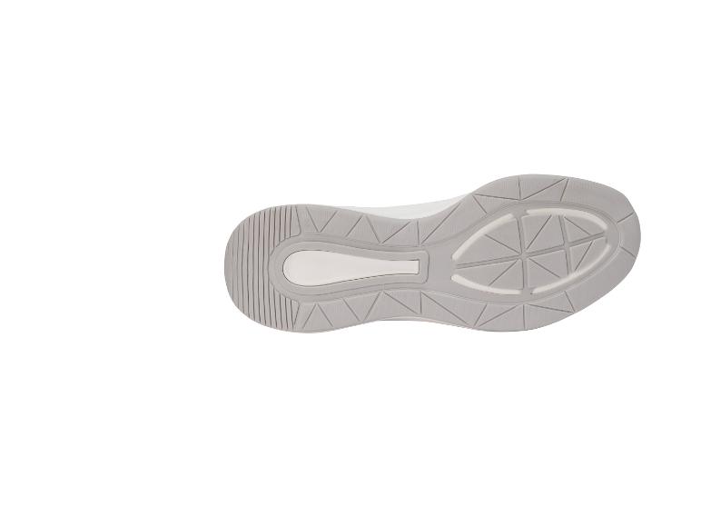Grijze en witte sportschoenzool met geometrisch patroon