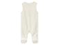 Crèmekleurige baby romper, mouwloos, met voetjes.