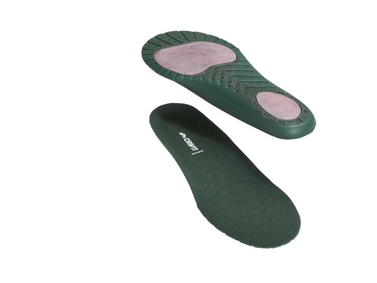 Twee groene inlegzolen, één omhoog en één omlaag gericht.