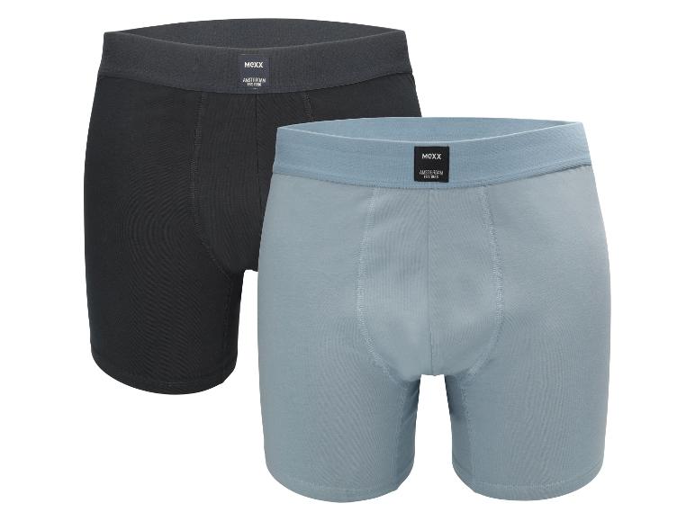 Twee heren katoenen boxershorts, één zwart en één lichtblauw, met elastische taillebanden.