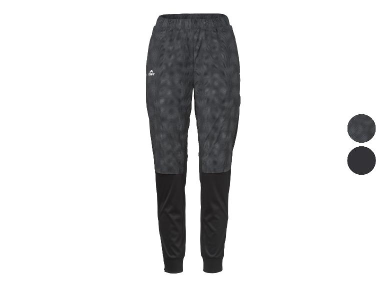 Zwarte en grijze sportbroek met patroon, met twee kleurstaaltjes aan de zijkant.