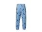 Blauwe kinder joggingbroek met dinosauruspatroon.