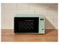 Mintgroene magnetron met digitaal display en bedieningselementen in een moderne keuken.