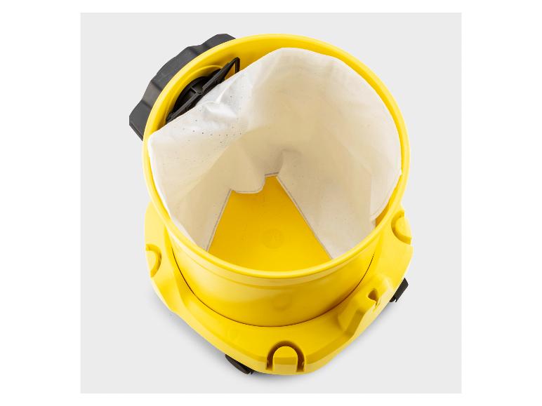 Bovenaanzicht van een gele nat- en droogzuiger met een witte filterzak erin.