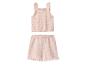 Roze gebreide baby set met ruches: topje en short met opengewerkt patroon.