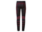 Zwarte sportleggings met rode accenten.