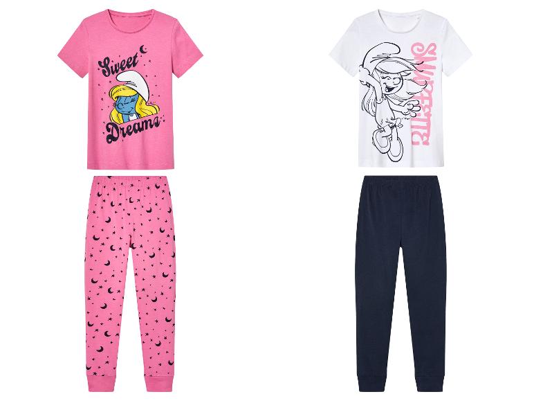 Twee Smurfen pyjama's, één roze met sterren en maan print en één wit met Smurfet.
