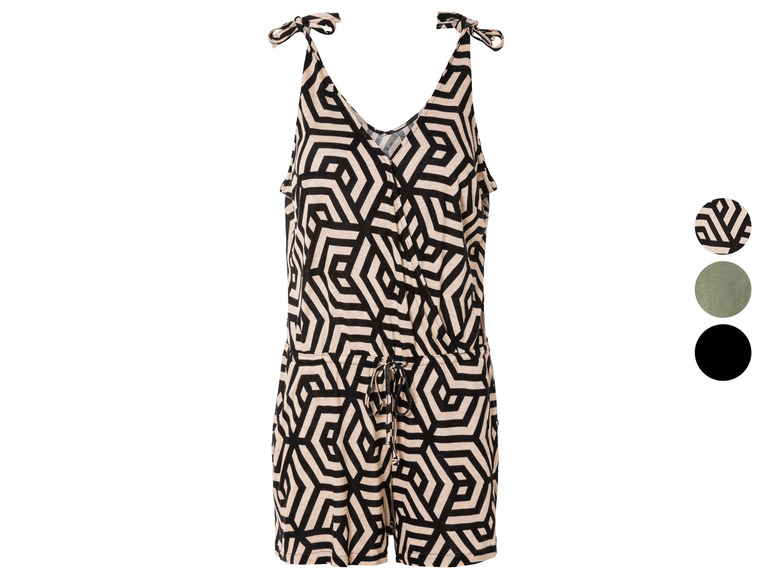 Een beige jumpsuit met zwart geometrisch patroon.