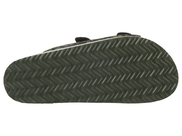 Zool van kindersandalen met gegolfd patroon.