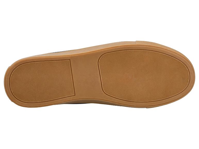 Zool van een bruine schoen met gestreept patroon