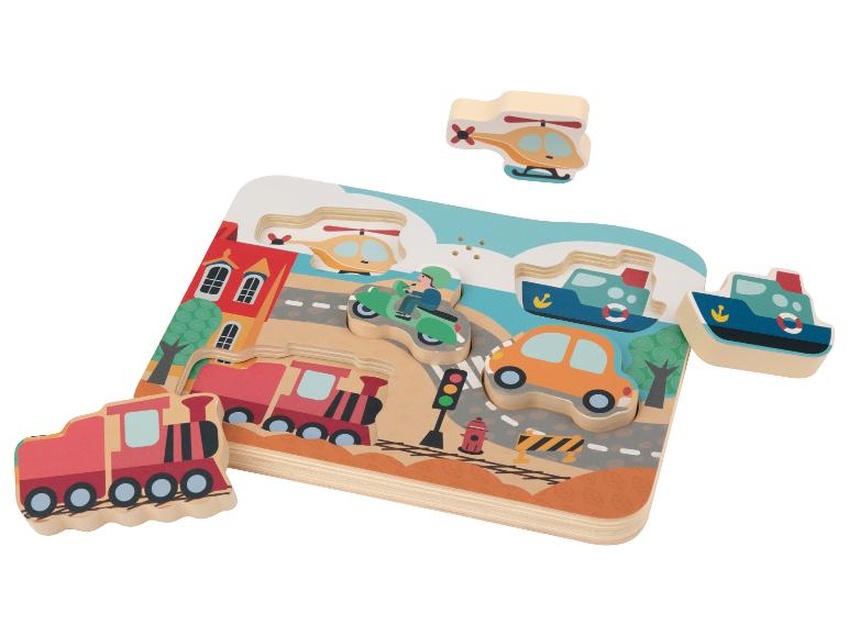 Houten puzzel met vervoersmiddelen: trein, auto, boot, helikopter en motor.