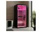 Moderne infraroodsauna met roze verlichting in een badkamer met bad en plant.