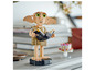Lego Dobby-figuur met een boek in de hand.