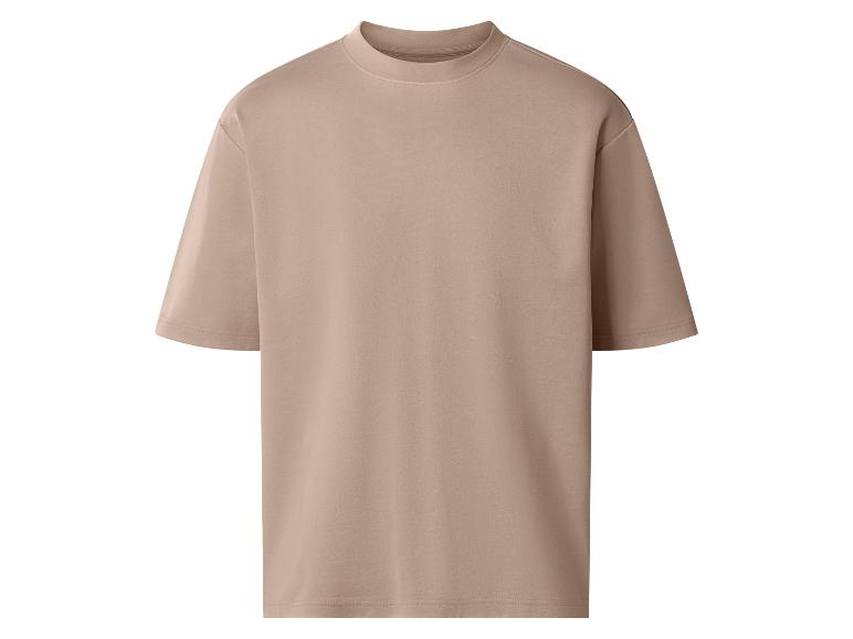 Beige T-shirt met korte mouwen en een losse pasvorm.
