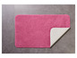 Een roze badmat met een antislip onderkant