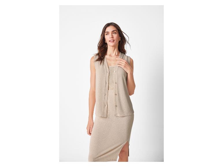 Beige gebreide rok en vest set.