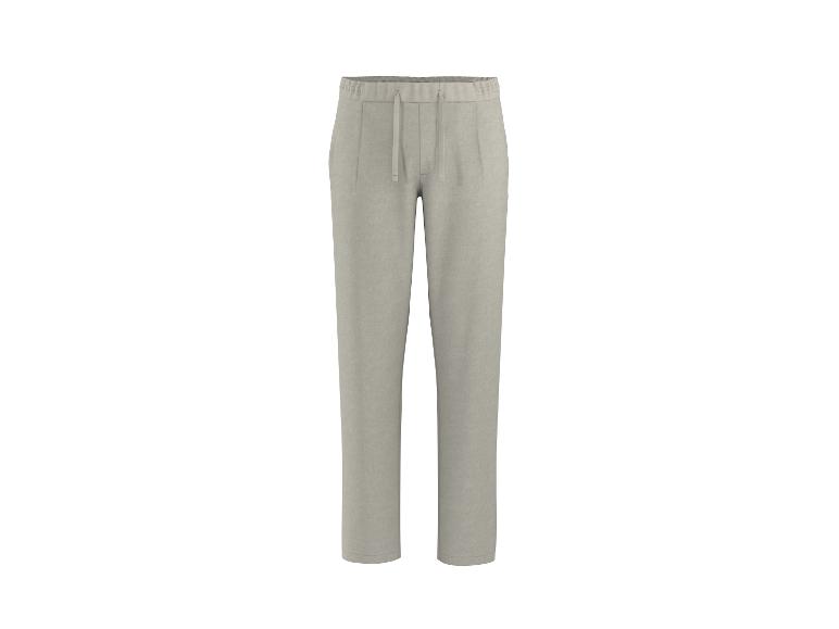 Lichtbeige joggingbroek met trekkoord in de taille.