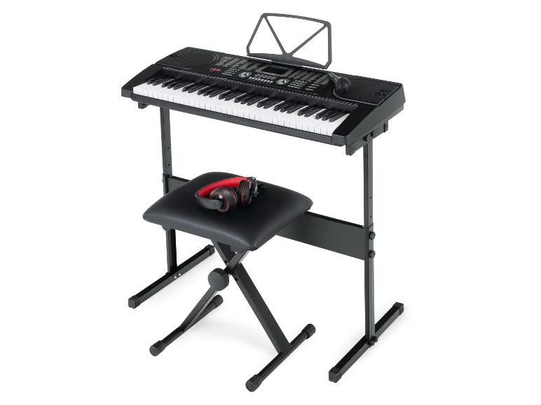 Digitale pianoset met keyboard, standaard, kruk en koptelefoon.