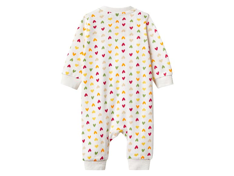 Witte baby romper met kleurrijk hartjespatroon