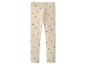 Beige legging met zwarte hartjesprint