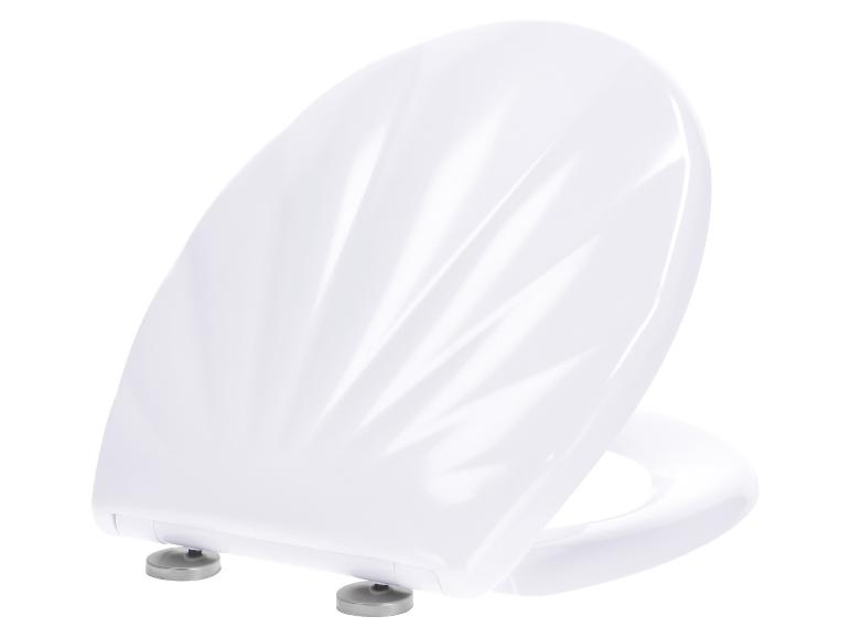 Witte toiletbril met zitting, zijaanzicht.