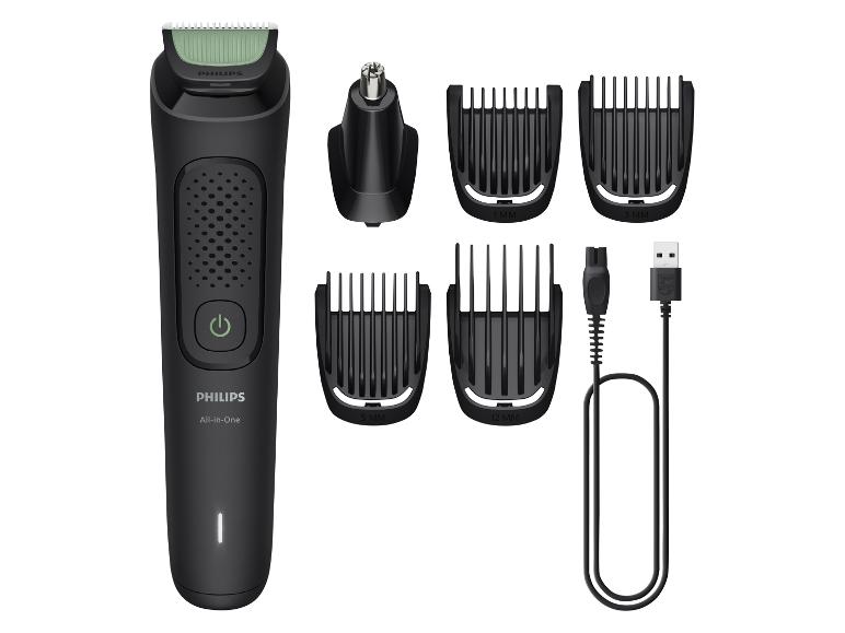 Philips All-in-One trimmer met diverse opzetstukken en oplaadkabel.