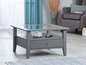 Grijze salontafel met glazen blad en lade.