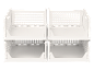 Witte modulaire, stapelbare opbergbakken met geperforeerde zijkanten.