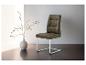 Taupe design stoel van stof, metalen onderstel.