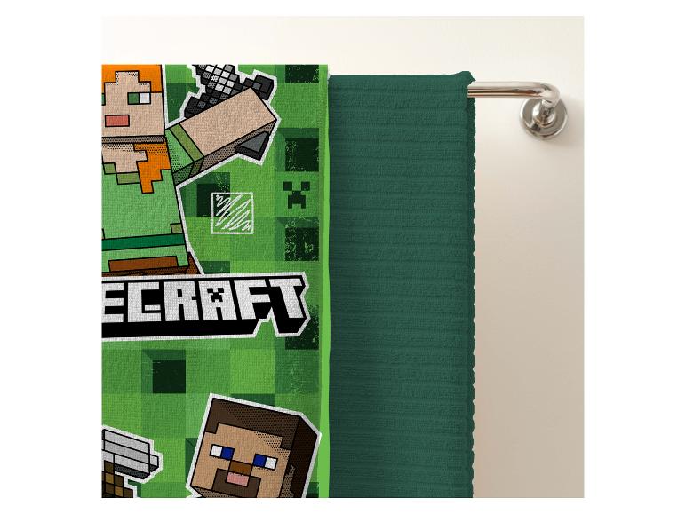 Minecraft handdoeken en een effen donkergroene handdoek.