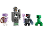 Vier speelgoedfiguren in pixelstijl: een paars skelet, een grijze golem, een zwarte krijger en een groene creeper.
