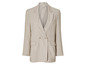 Een beige blazer met dubbele knopen.