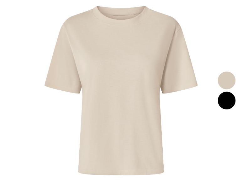 Beige T-shirt met korte mouwen en kleurkeuzes in beige en zwart.