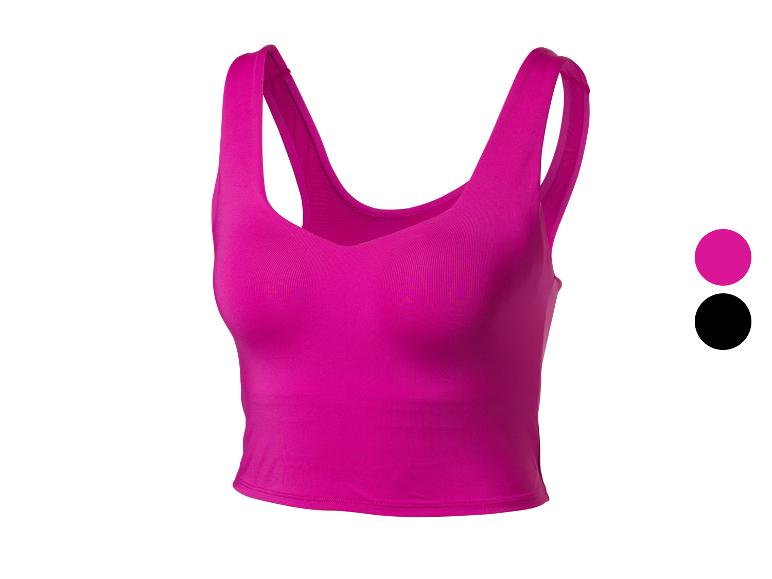 Fuchsia sportieve crop top met brede bandjes, verkrijgbaar in fuchsia en zwart.
