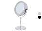 Ronde chromen make-upspiegel met LED-verlichting en stabiele voet.