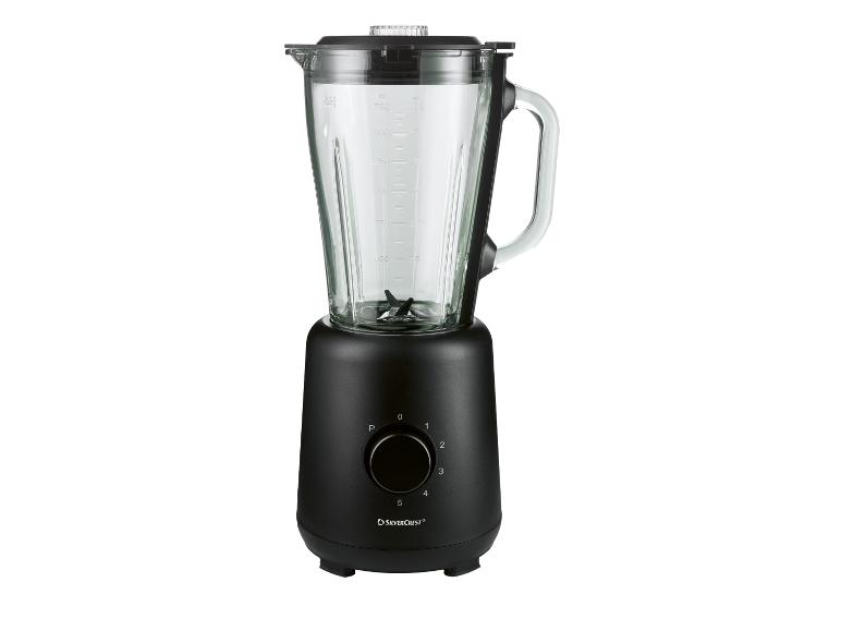Zwarte blender met glazen kan, voorzien van een draaiknop met snelheidsinstellingen van 0 tot 5 en een pulsfunctie.