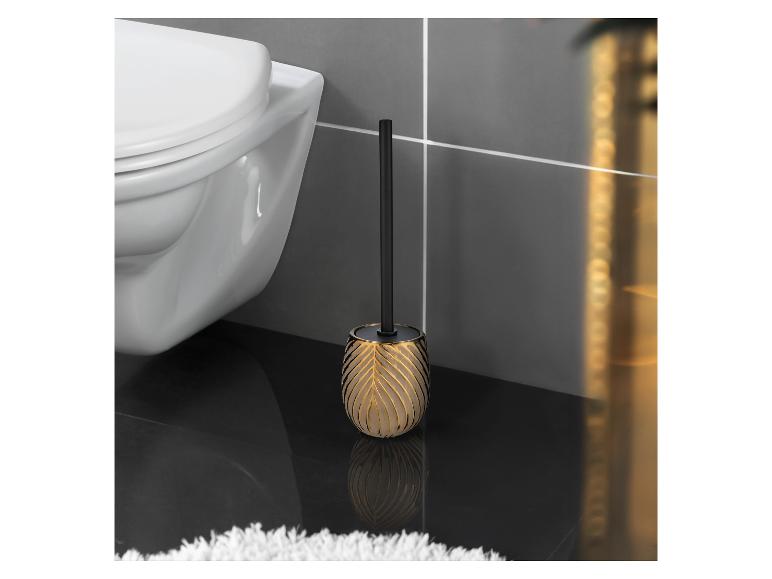Gouden toiletborstel met zwarte steel.