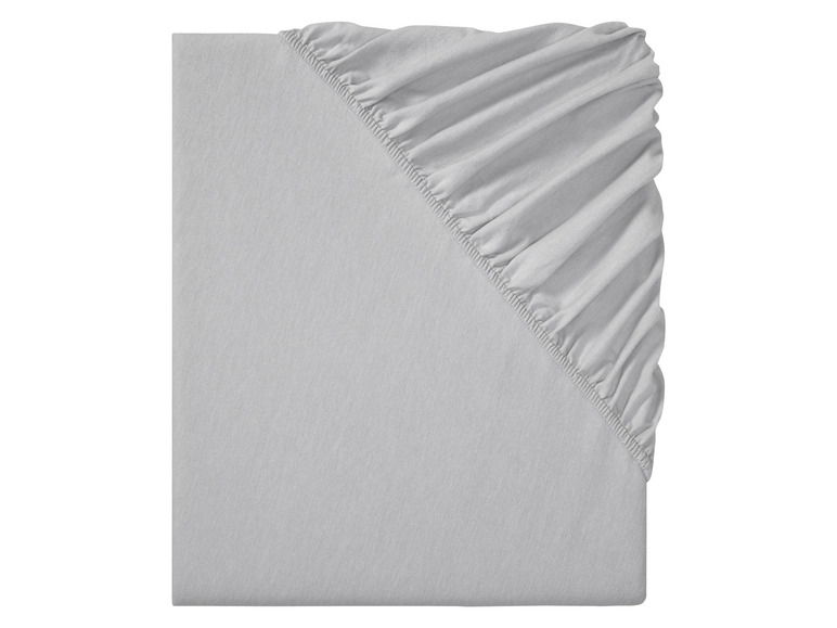 Een grijs hoeslaken met elastiek.