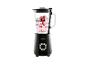 Zwarte blender met glazen kan gevuld met bessen en yoghurt.