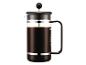 Zwarte Bodum French Press koffiezetapparaat met koffie op een witte achtergrond.