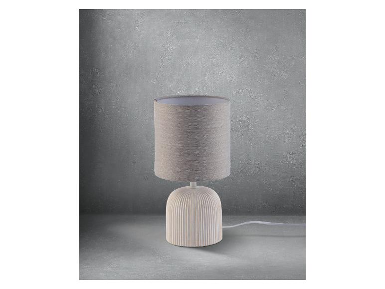 Beige tafellamp met linnen lampenkap: minimalistische stijl.