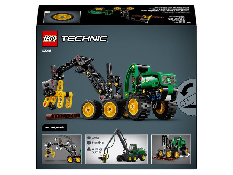 Technisch speelgoedset met een groene tractor en manipulator afgebeeld op de verpakking.