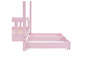 Een roze bed met twee laden op wieltjes.