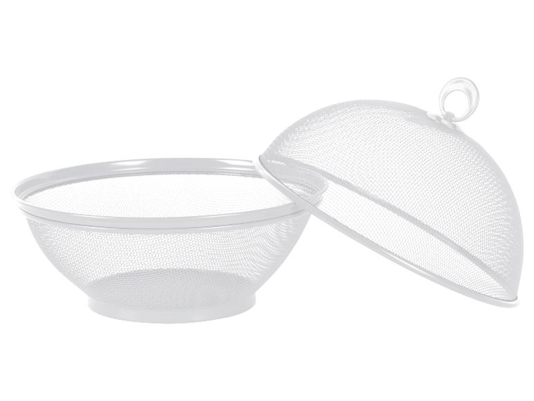 Witte metalen fruitschaal met deksel, opengewerkt design.