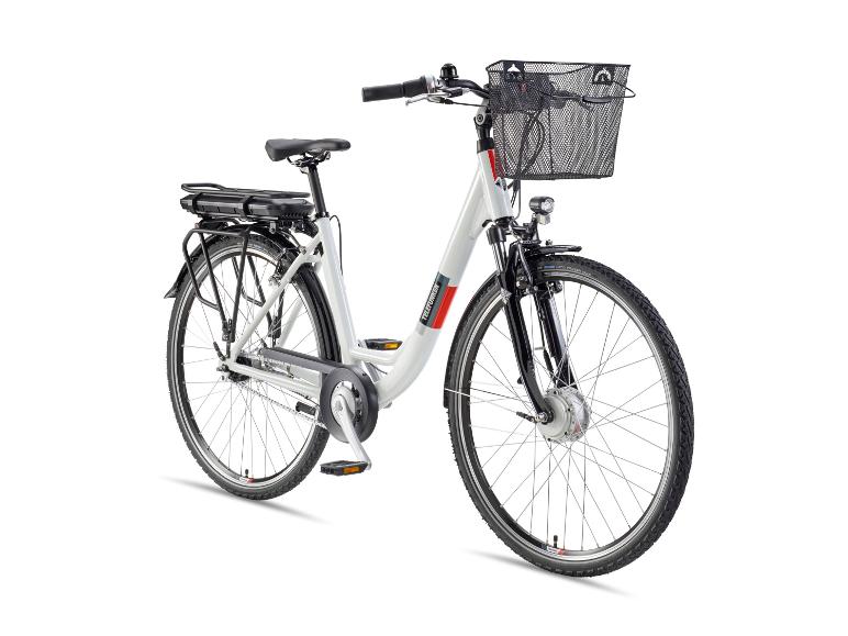 Witte elektrische fiets met zwarte bagagedrager en voormand.