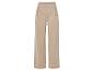 Beige wijde broek met gouden knopen.