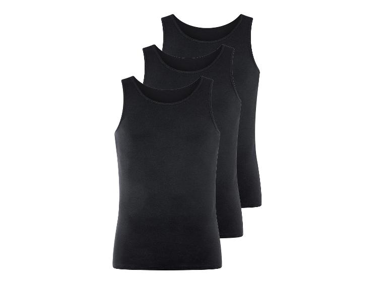 Drie zwarte tanktops.